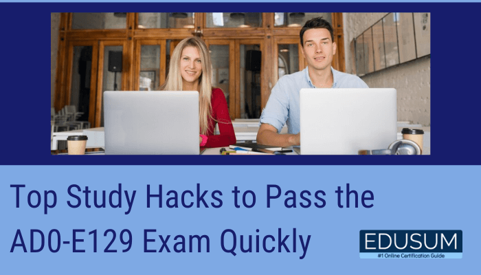 The image showcases a professional and educational theme, featuring two individuals sitting at a shared desk, each working on their laptops. The setting appears to be a modern and well-lit workspace, suggesting a collaborative and productive environment ideal for study or preparation. At the top of the image, bold text reads: "Top Study Hacks to Pass the AD0-E129 Exam Quickly" This headline draws attention to tips and strategies for efficiently preparing for the AD0-E129 exam, which relates to Adobe certification. The bottom right corner of the image includes the Edusum logo, accompanied by the tagline: "#1 Online Certification Guide"